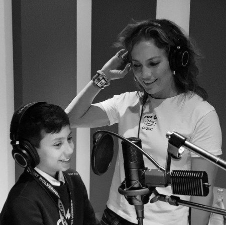 Maximilian David Muniz singing in a studio with his mother Jennifer Lopez